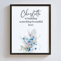 Framed print with floral design and text on a white background