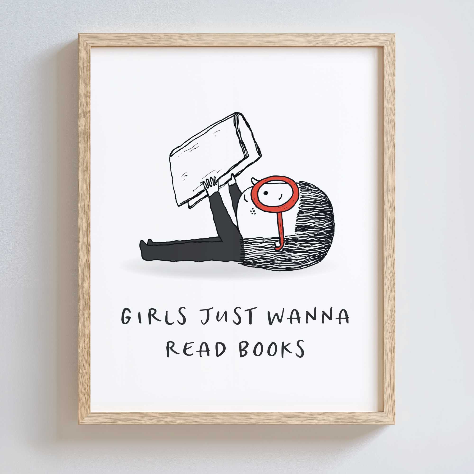 Framed artwork with a black and white illustration of a girl with large red glasses, holding a book, with text 'Girls just wanna read books' on a white background.