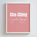 Framed pink poster with 'Cha-Ching is my love language' text on a white background