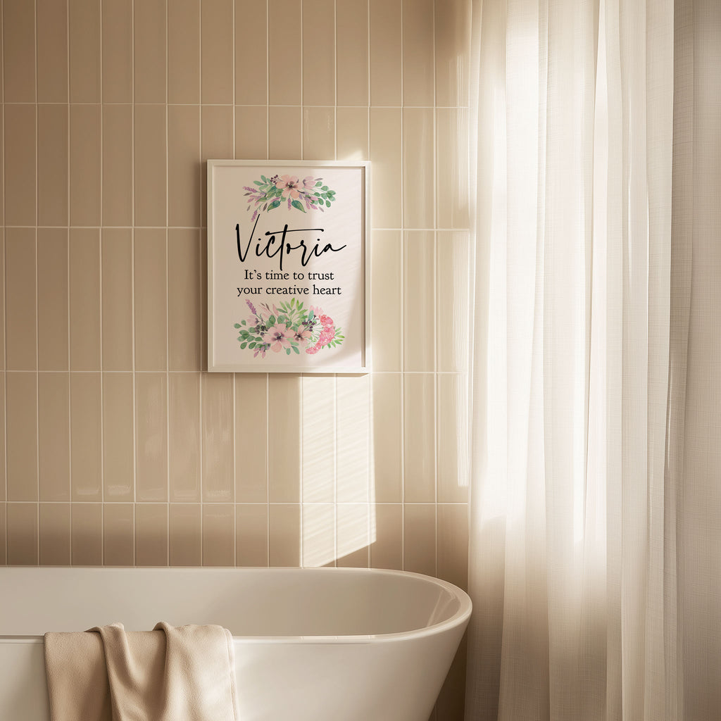 Bathroom with a framed motivational poster on the wall