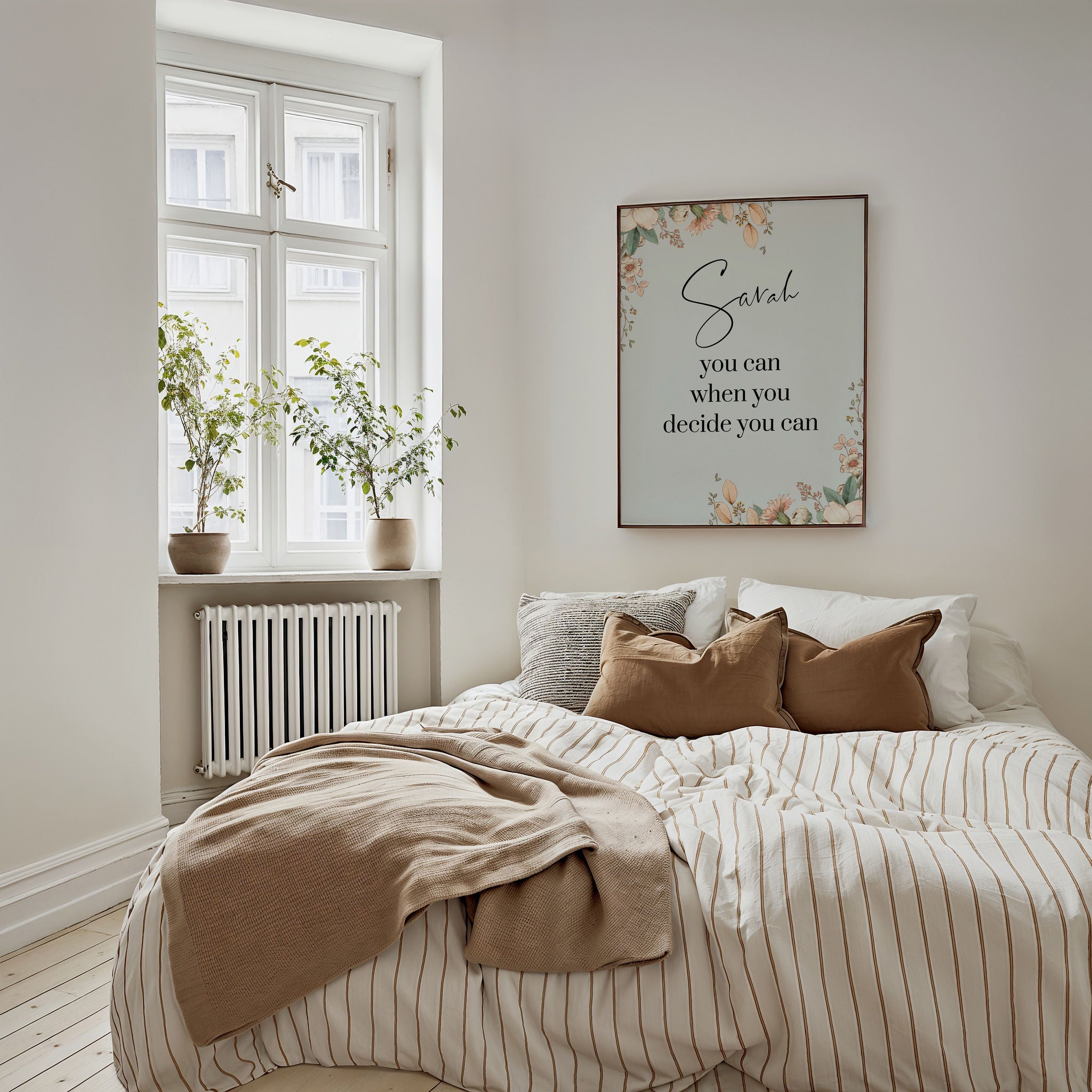 Botanical custom name wall art hung on a bedroom wall. A floral print in a soft palette.
