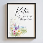 Motivational art with handwriting font and watercolor flowers in a black frame