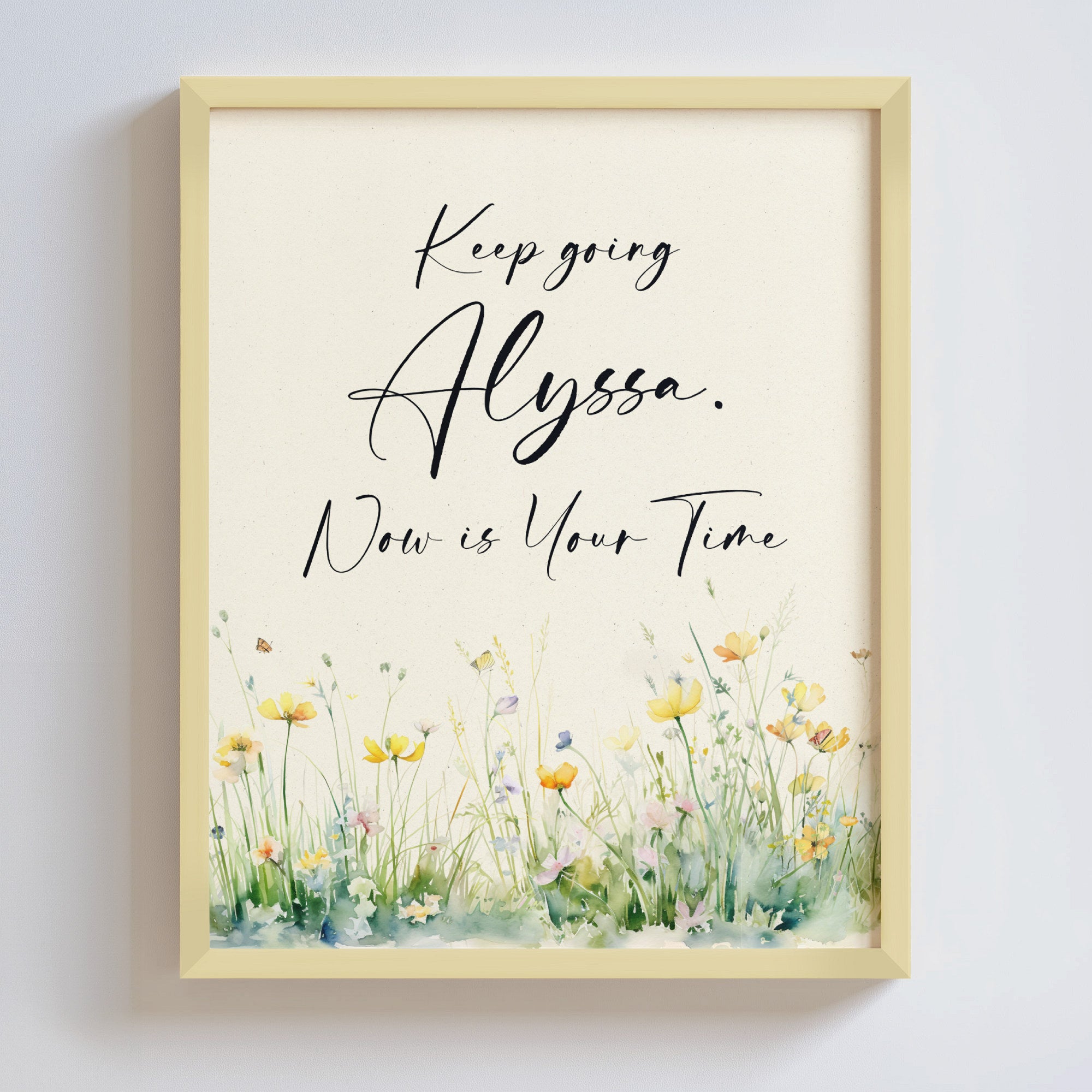 Framed personalized motivational quote with floral design on a light background